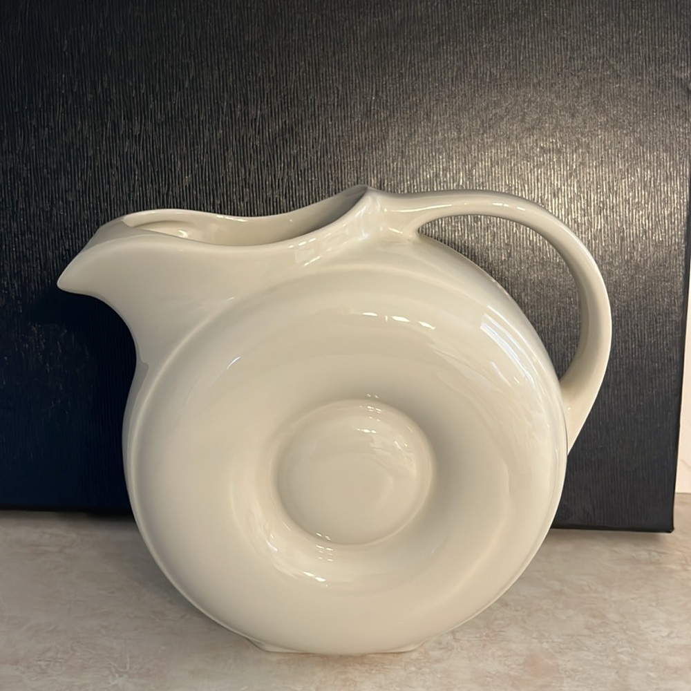 Hall Vintage MCM off-white donut pitcher #1335 is a must-have for collectors